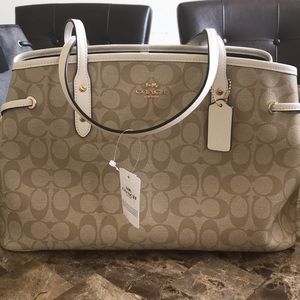 White Coach purse.
